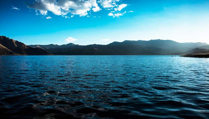 tour to waqrapukara in cusco, pomacanchi lake